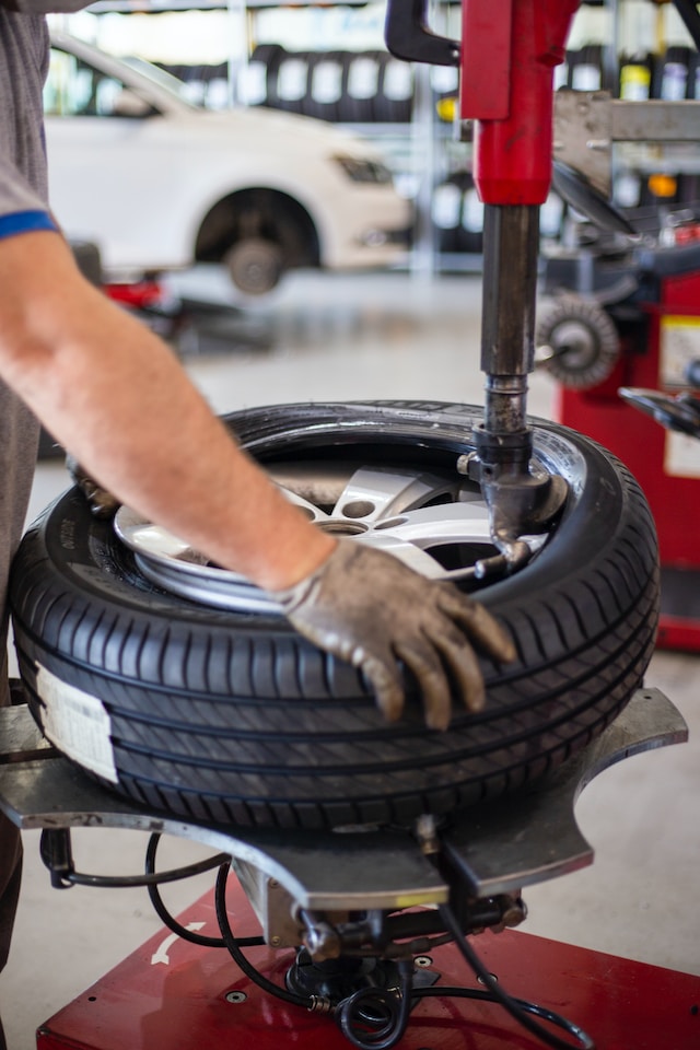 Man doing tire maintainence