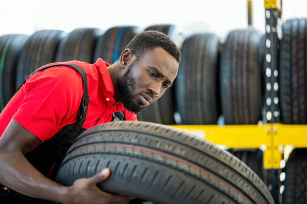 Man working with tyre